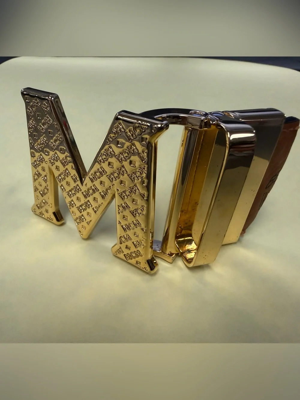 MCM Gold Tone Initial “M” Automatic Ratchet Belt Buckle Designer Logo